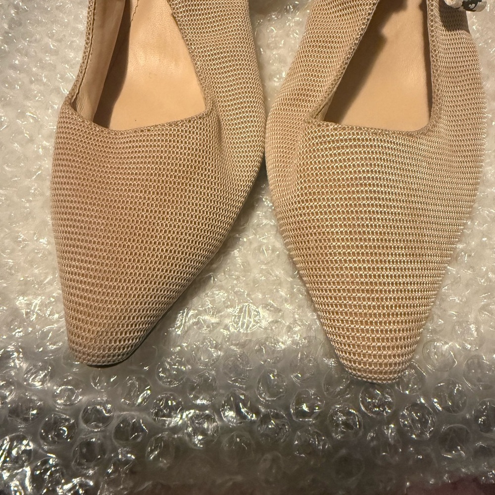 Dior Tan Heels with Elegant Slingback Style . They fit like a size 8.5 .